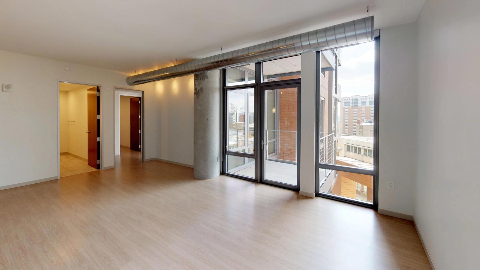 Spacious one-bedroom apartment at The Pressman Apartments in downtown Madison with a private balcony overlooking the city