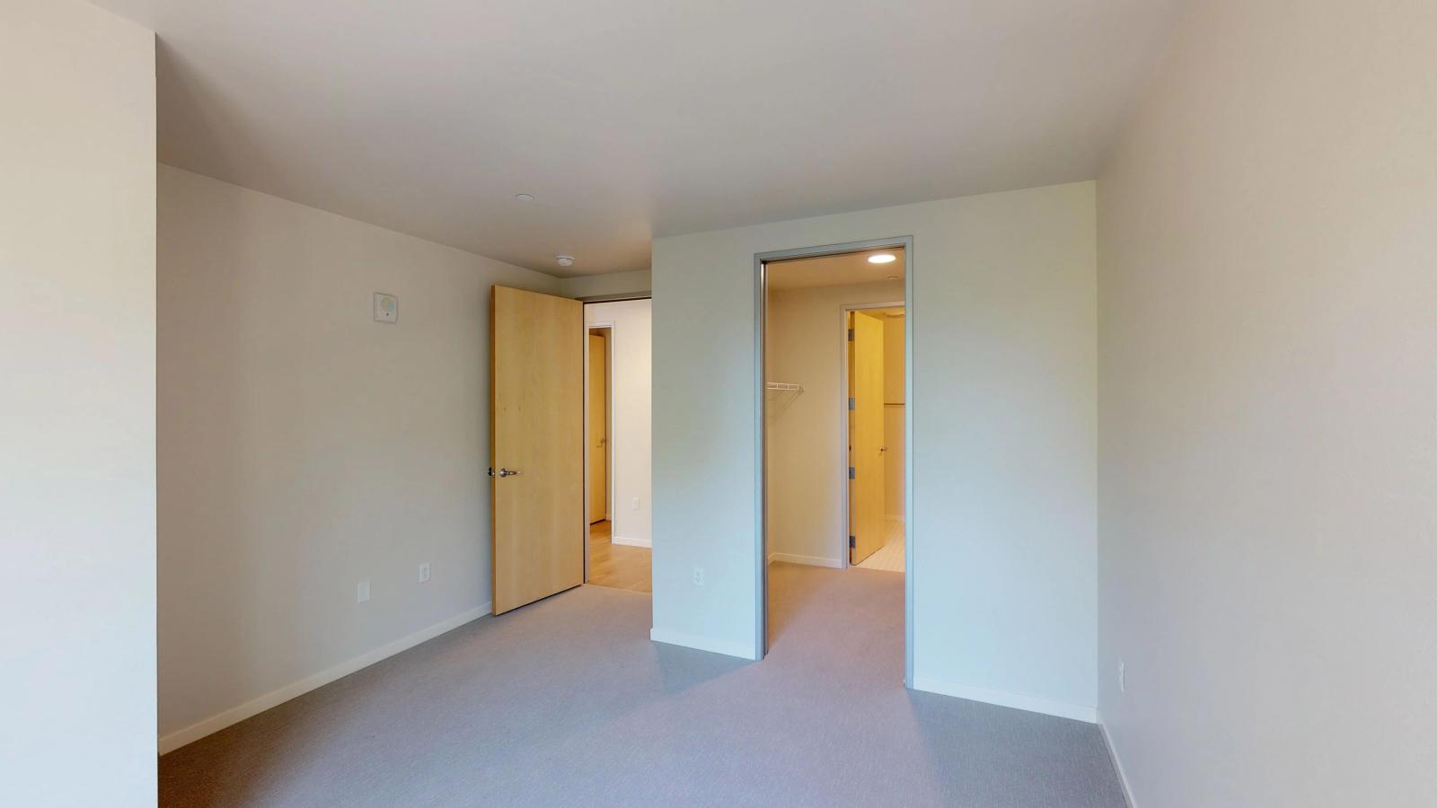 Sleek and spacious two-bedroom apartment at Quarter Row in downtown Madison, designed with modern features ample closet space.