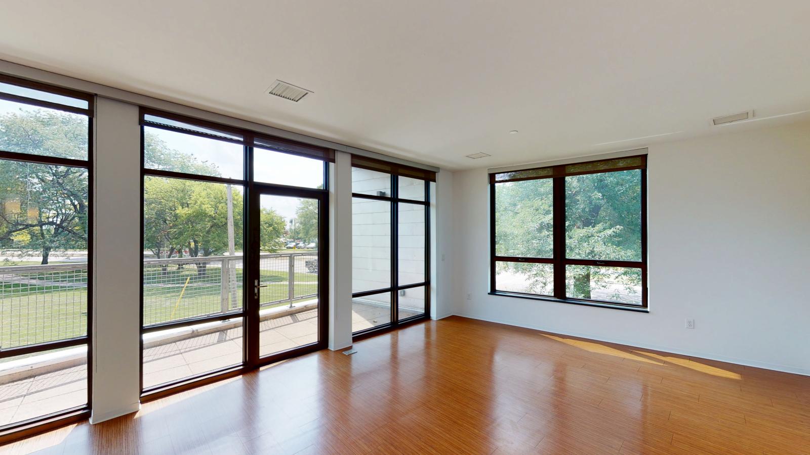 Modern corner two bedroom apartment with luxury finishes, Lake Monona views and private balcony at SEVEN27 in downtown Madison