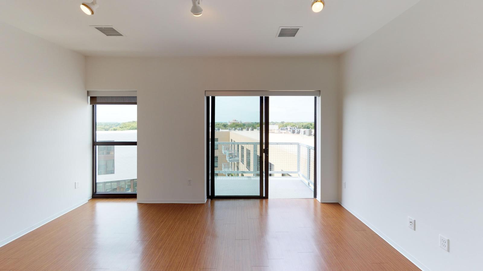 Top floor studio apartment with private balcony and Lake Monona views at SEVEN27