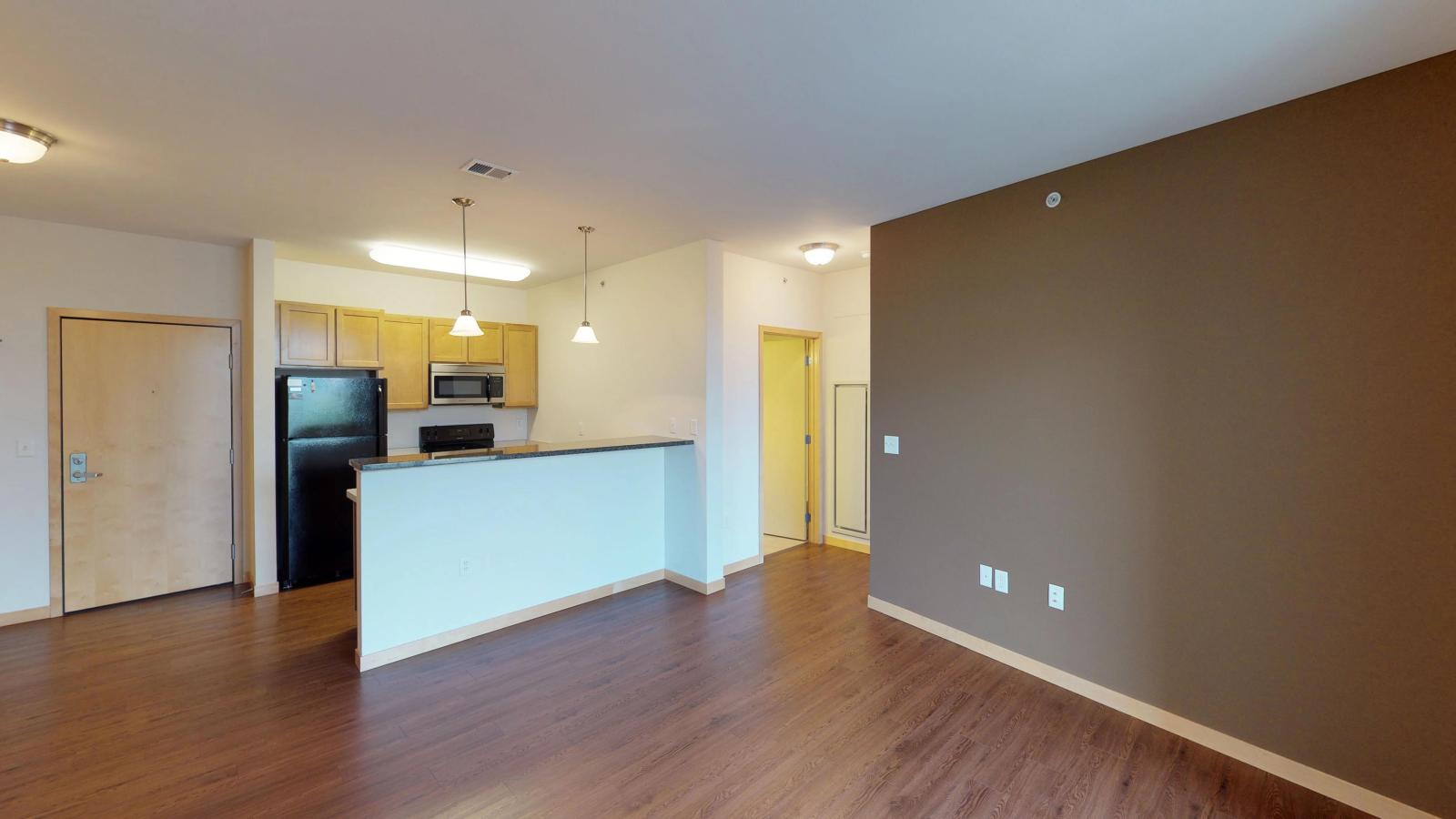 One bedroom apartment with warm finishes and ample space at The Depot in downtown Madison