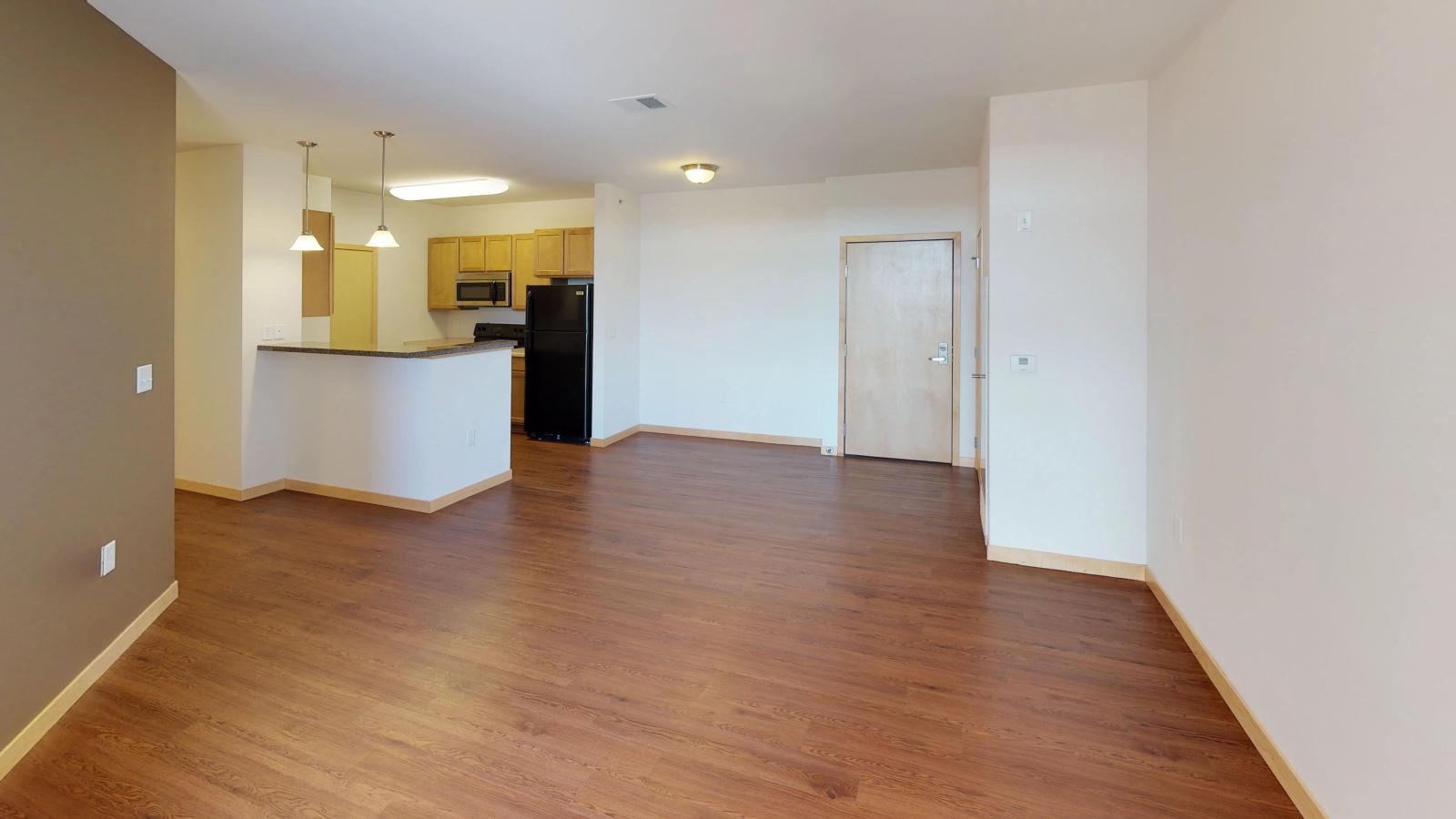 One bedroom plus den apartment with a classic ktichen offering soft finishes and ample storage at The Depot in downtown Madison
