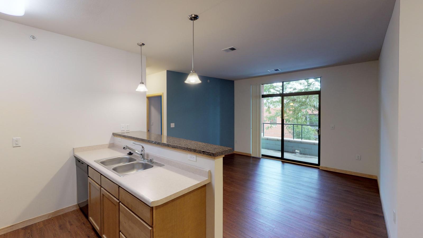 One bedroom apartment with warm finishes and ample space at The Depot in downtown Madison