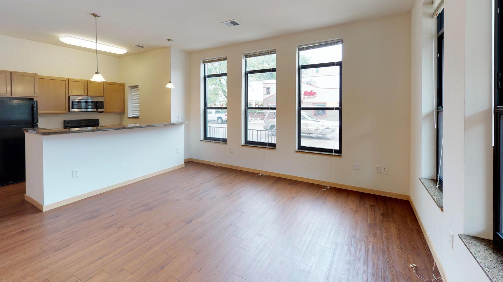 Two story townhome with a large living area and standard kitchen at The Depot in downtown Madison