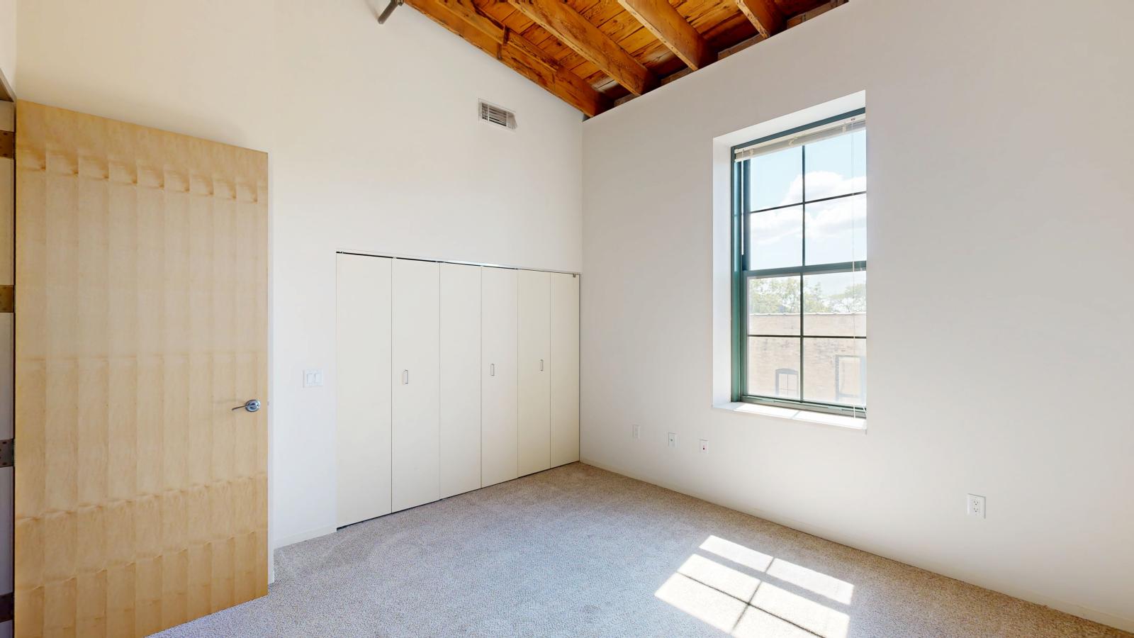 Spacious one bedroom apartment with a blend of historic and contemporary design at Tobacco Lofts at The Yards in downtown Madison