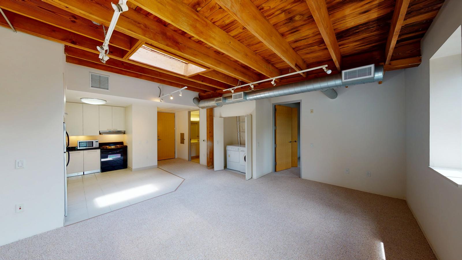 Spacious one bedroom apartment with a blend of historic and contemporary design at Tobacco Lofts at The Yards in downtown Madison