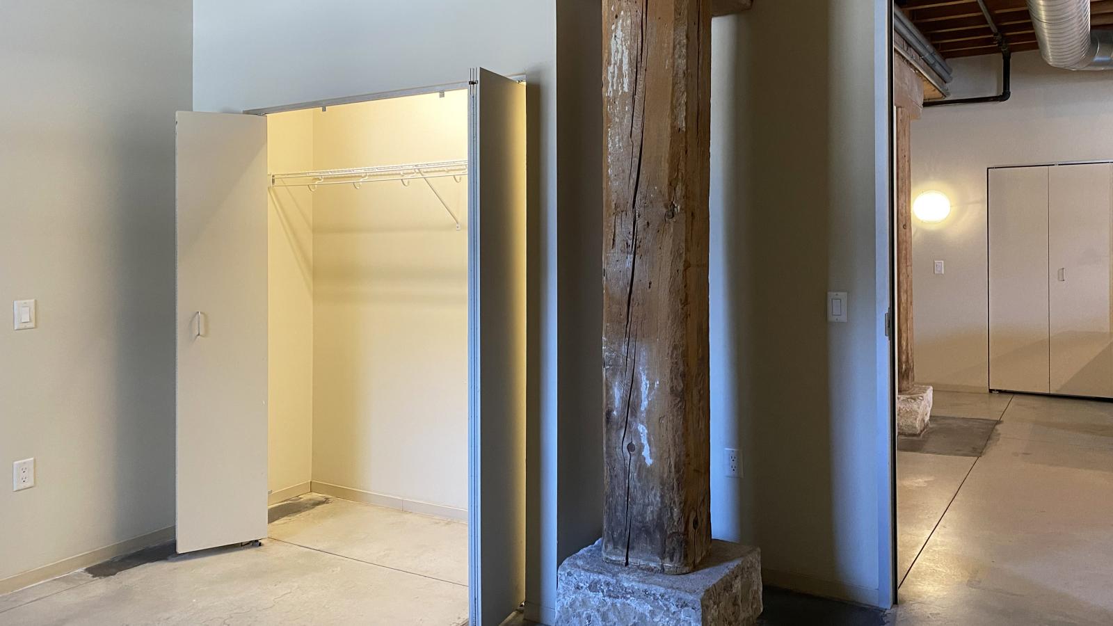 Garden level one bedroom apartment with polished concrete floors at Tobacco Lofts