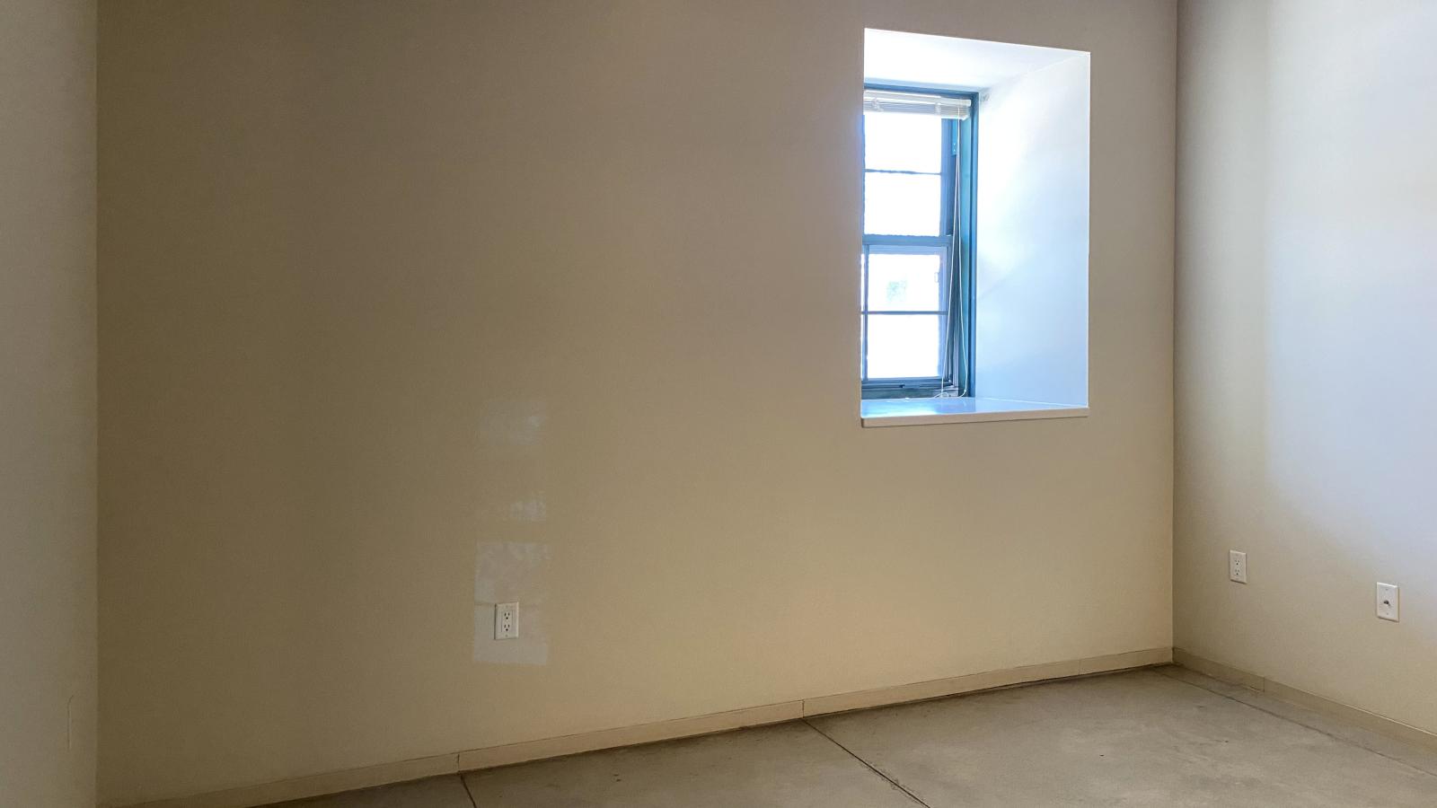 Garden level one bedroom apartment with polished concrete floors at Tobacco Lofts