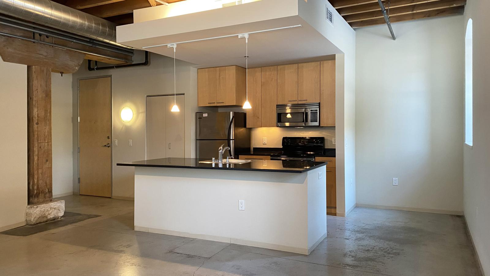 One bedroom apartment with stainless steel appliances at Tobacco Lofts