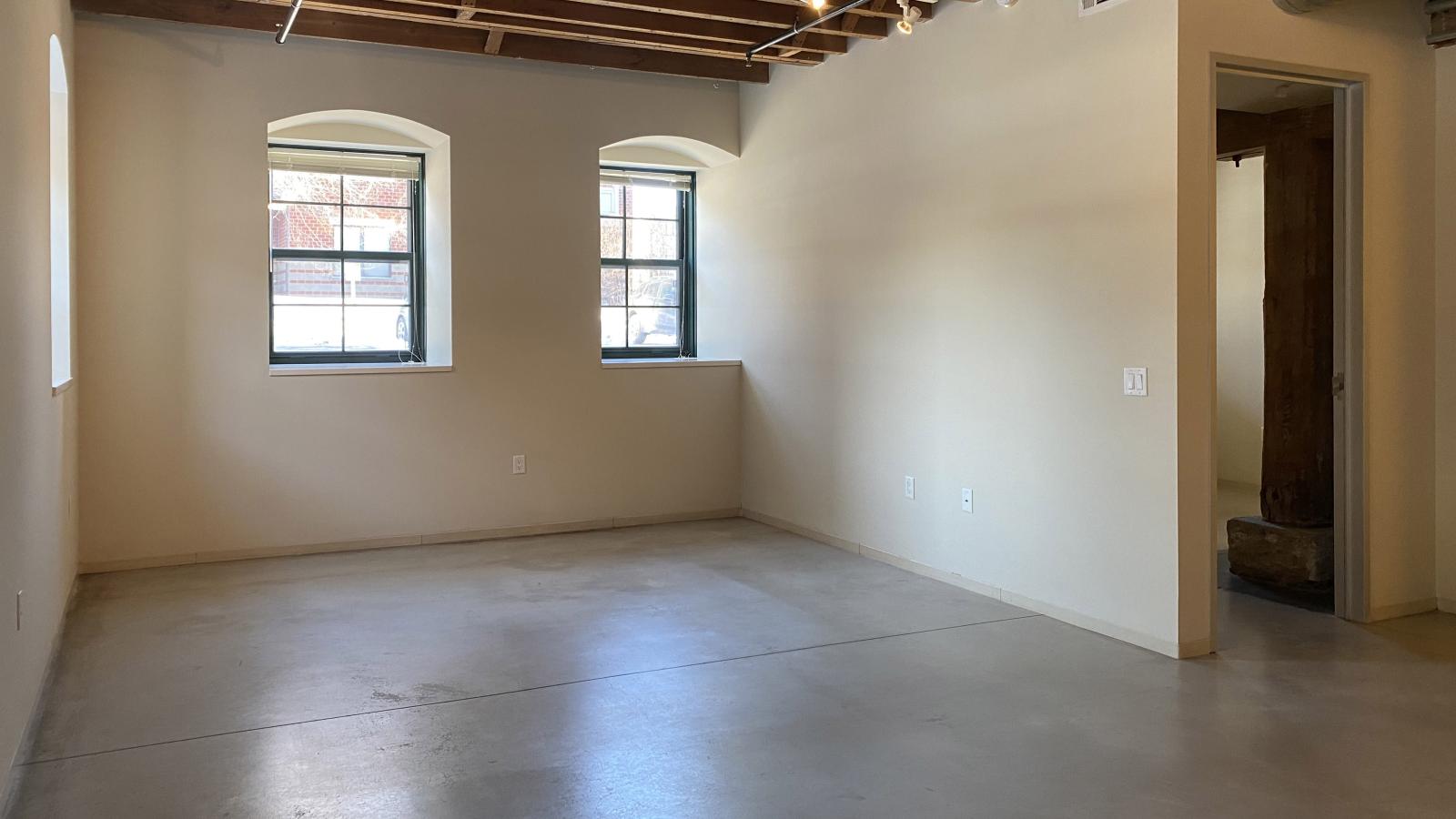 Spacious one bedroom with polished concrete floors, and historic charm at Tobacco Lofts