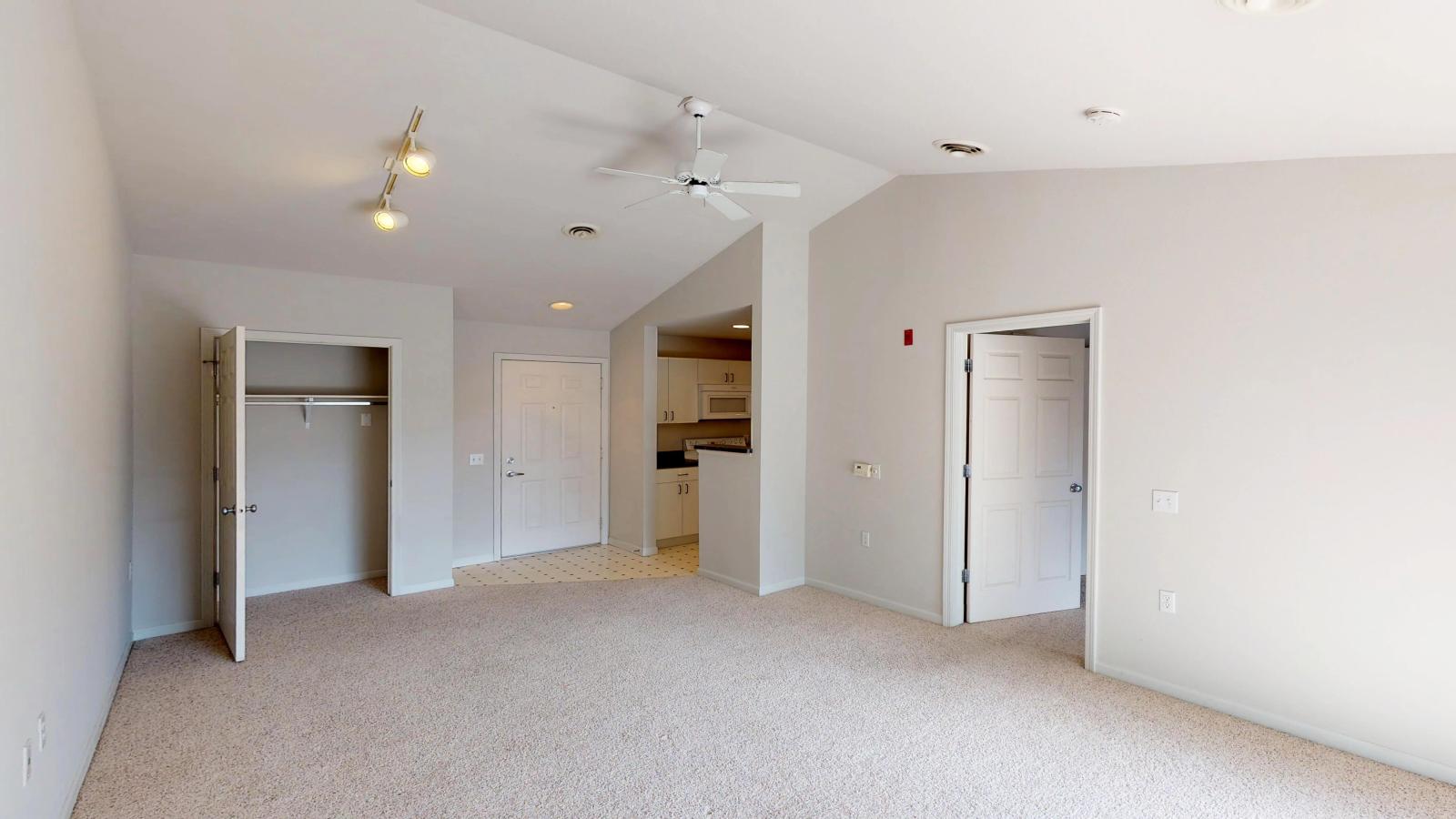 Cozy living room with soft finishes and dinning space at Wilson Bay