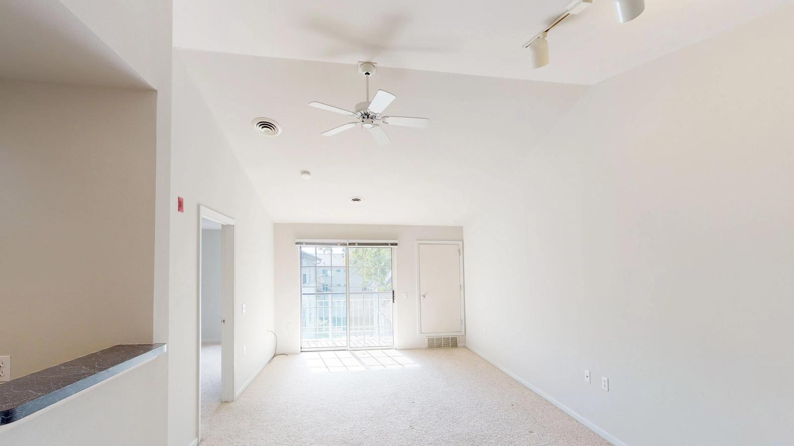 Cozy living room with soft finishes and abundant natural light at Wilson Bay