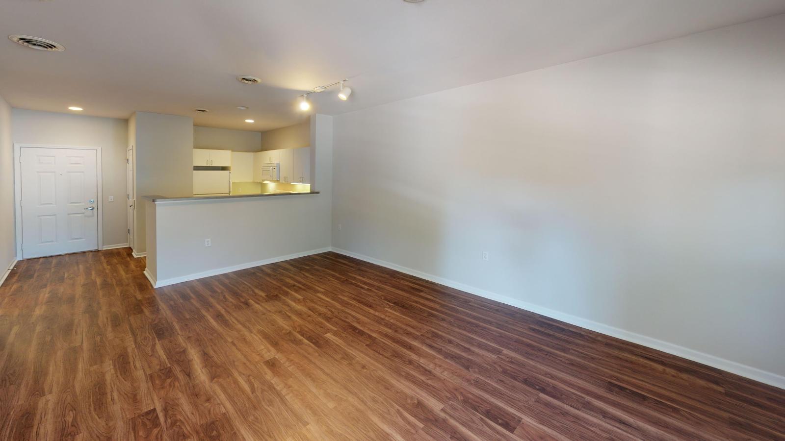 Cozy living room with soft finishes and dinning space at Wilson Bay