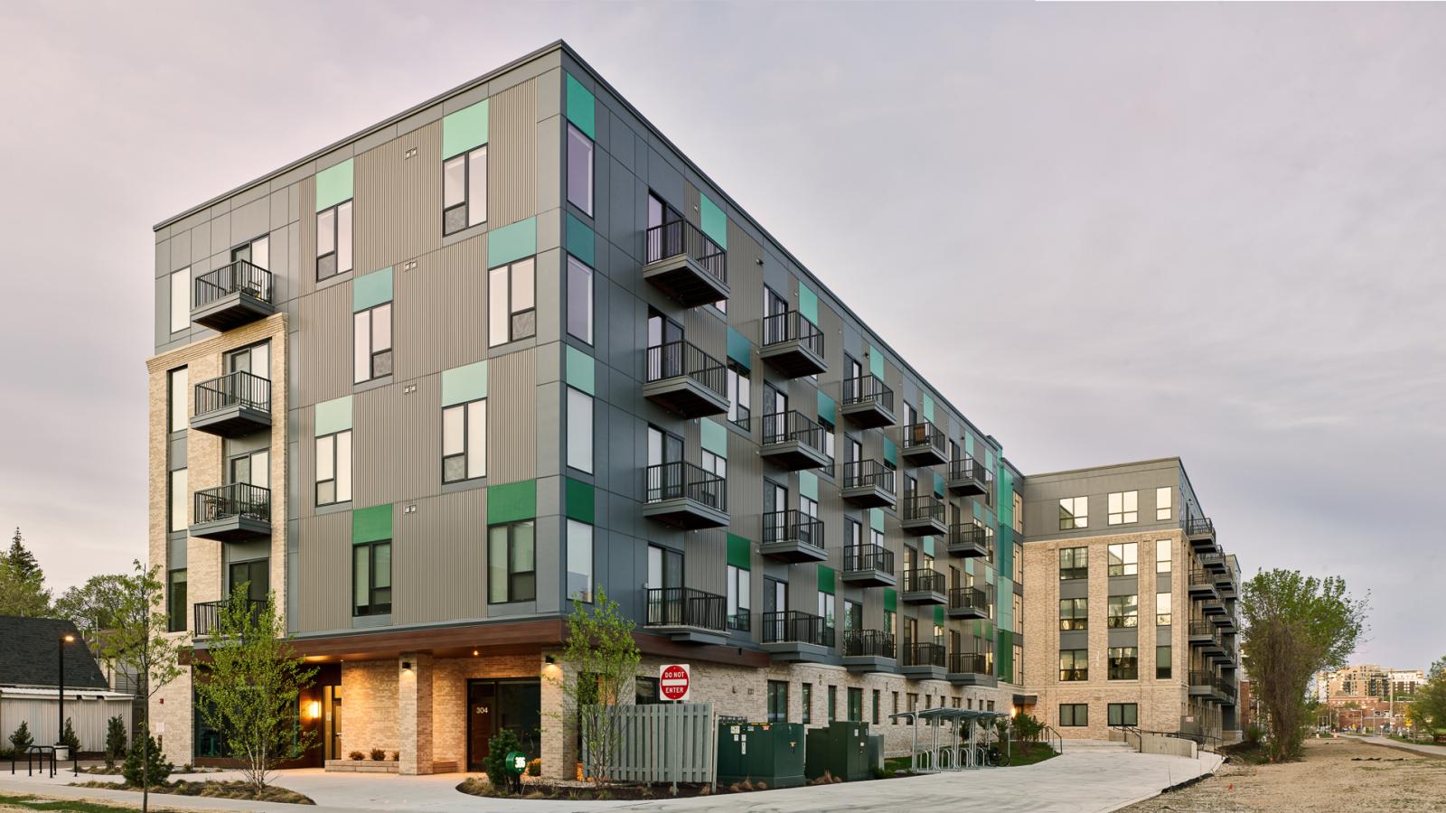 The Irwin North exterior along Paterson Street in Madison’s Willy Street neighborhood featuring modern apartment design on the Capitol City Bike Trail 