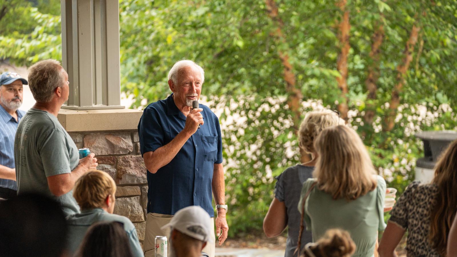 Urban Land Interests leadership speaking to employees and their families during the annual company picnic at Henry Vilas Zoo