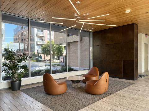 A welcoming entry with Wi-Fi access, great for a quick email check or catching up while you wait at The Nine Line Apartments in downtown Madison