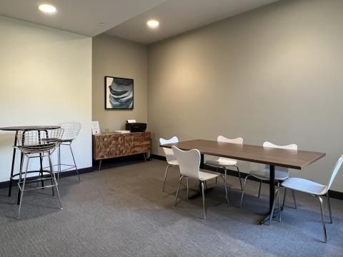 Quarter Row resident office space offers a getaway for work from home focus, equipped with WiFi, printer, and courtyard view