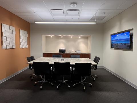 The Pressman resident conference room offers a professional setting to work, host meetings, and get out of your apartment for better work focus 