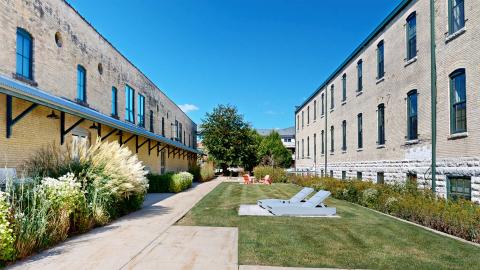 The Tobacco Lofts Courtyard is a perfect place to soak up the sun, relax with a book, or gather with friends. 