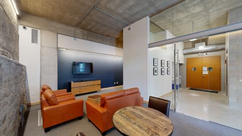 The Tobacco Lofts Apartments lounge is the perfect space to gather with friends, watch have a movie night, or to just pop by for a quick cup of coffee